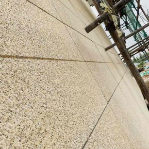 临沧 黄金麻花岗岩荔枝面外墙干挂石材效果示例