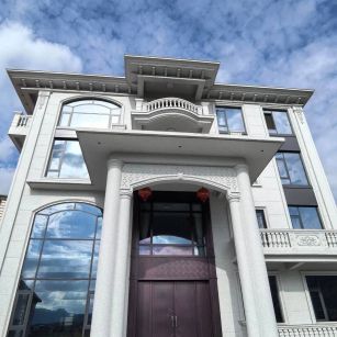 临沧白麻别墅外墙干挂石材效果示例