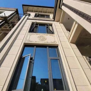 临沧 黄金麻荔枝面别墅外墙干挂效果展示