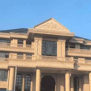 临沧黄金麻别墅外墙干挂石材效果示例