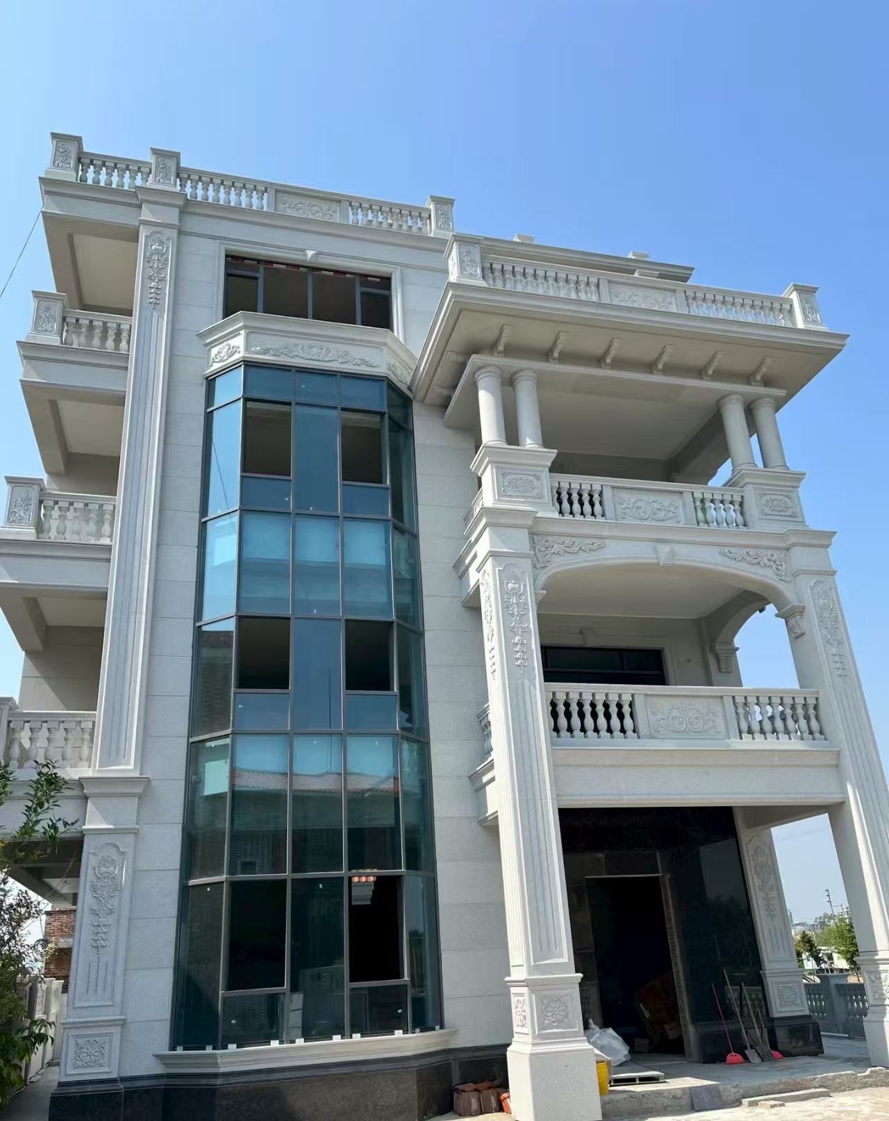 临沧 白麻花岗岩别墅外墙干挂效果展示